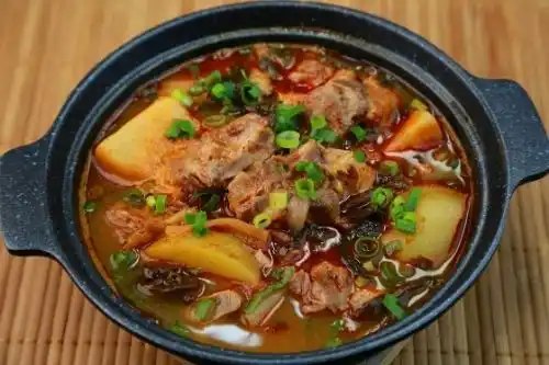 Gamjatang - thick soup of pork and potato
