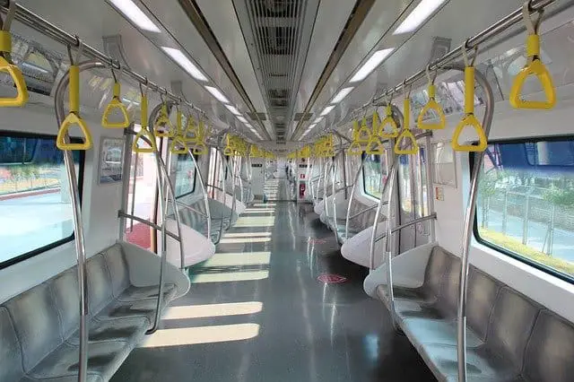 the interior of a korean subway on its way to Busan from Seoul