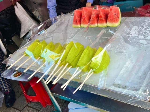 Korean street food, fruits skewer in Namdaemun market